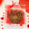 Opengewerkt chocoladehart met LOVE-zegel – cadeauverpakking