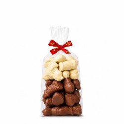Zakje van 300 g met chocoladen Sintfiguurtjes in witte en melkchocolade, afgewerkt met rood Sintlint
