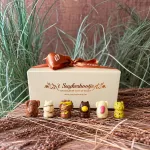 Ballotin met zoodiertjes in chocolade van 't Suykerbootje, met olifant, nijlpaard, leeuw en luipaard