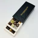 Unieke ambachtelijke pralines in een even unieke verpakking!